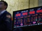 Traders work on the floor at the New York Stock Exchange in New York, Thursday, June 16, 2022. Markets worldwide are back to tumbling on Thursday as worries about a fragile economy roar back to the fore. The S&P 500 was 3.9% lower in afternoon trading, more than reversing its blip of a 1.5% rally from a day before. (AP Photo/Seth Wenig)