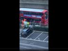 Mobile phone footage taken from a nearby block of flats showed paramedics placing a blanket over the victim as a crowd gathered at the scene.