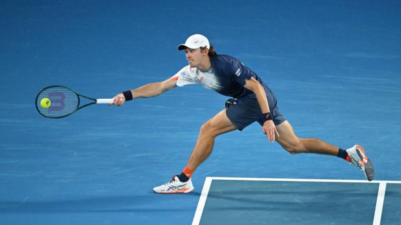 Alex de Minaur was at full stretch in his three-set win over Carlos Alcaraz in Melbourne. 