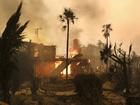 A home in Altadena burns to the ground as the Eaton Fire rages. 