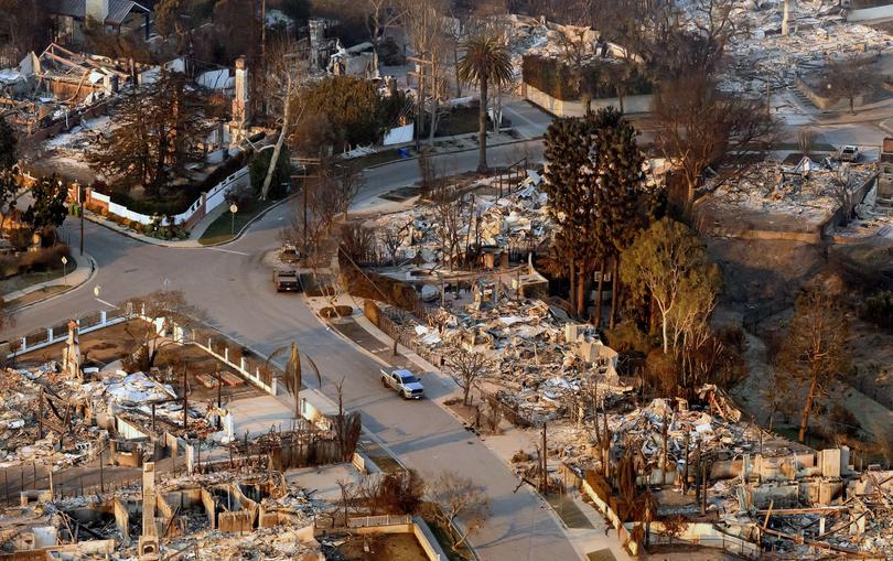 This satellite image provided by Maxar Technologies shows homes damaged from the Palisades Fire in the Pacific Palisades neighbourhood of Los Angeles, Thursday, Jan. 9, 2025. 