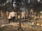 People embrace while looking over the remains of a home that was destroyed by the Eaton wildfire in the Altadena, California, USA, 09 January 2025. 