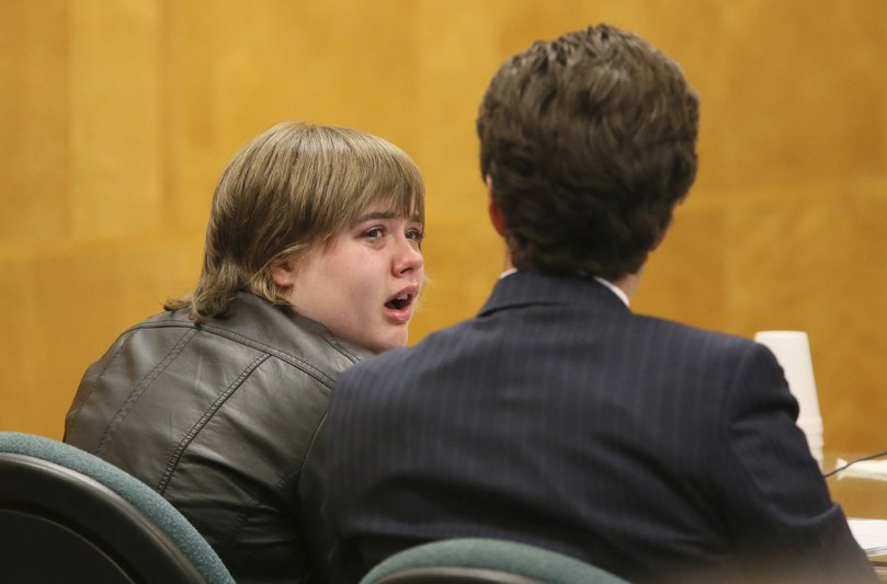 Morgan Geyser, left, looks to her attorney Anthony Cotton as she appears in a in a Waukesha County Courtroom in Waukesha, Wisconsin in 2017.