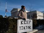 Sarah Bass, 27, holds a pro-TikTok sign in front of the Supreme Court ahead of arguments on social media app TikTok.