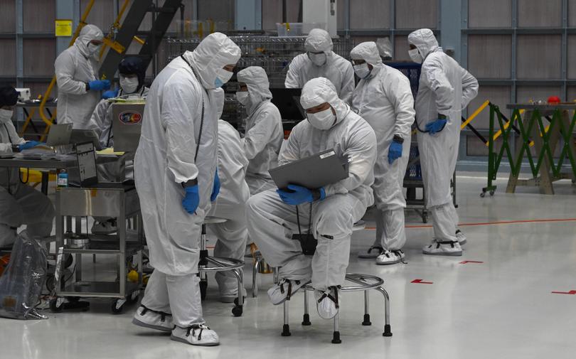 No dust or stray hairs are allowed in the clean room to protect the telescope's instruments.