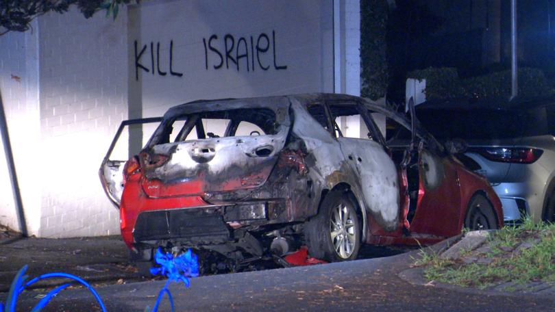 A crime scene was established after an antisemitic arson attack on a vehicle in Woollahra on Dec 11. 