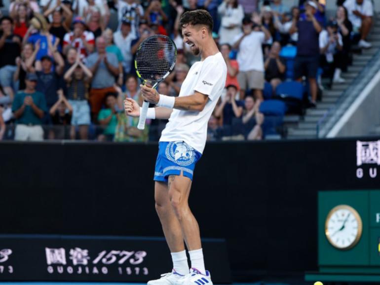 Thanasi Kokkinakis celebrates after a remarkable victory. 