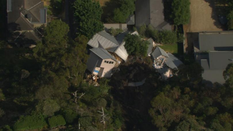 The home fell 50m onto the street below.