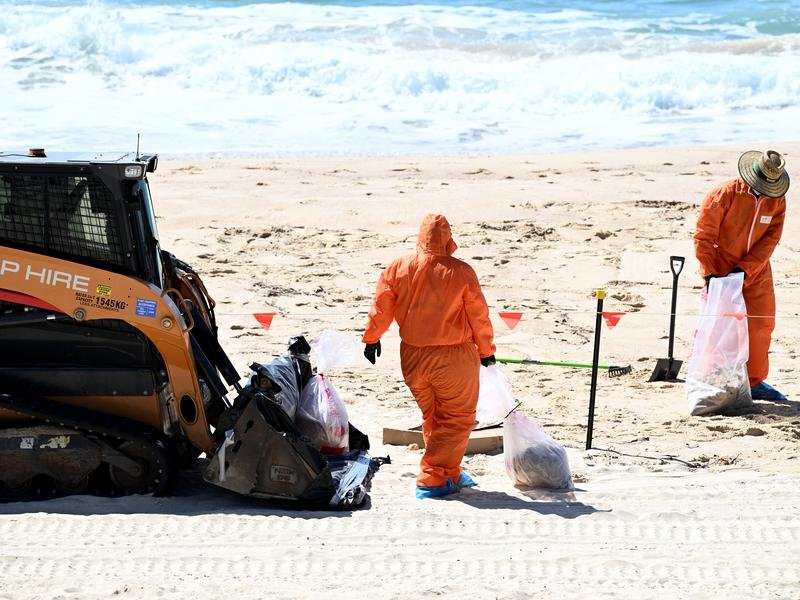 Workers spent days in October cleaning several beaches of tar balls that washed up in waves.