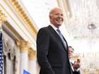 President Joe Biden greets the crowd before delivering  remarks about his foreign policy, at the State Department in Washington on Monday, Jan. 13, 2025