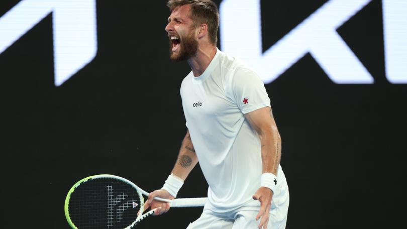  Corentin Moutet of France celebrates winning match point against Alexei Popyrin of Australia.