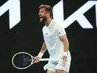  Corentin Moutet of France celebrates winning match point against Alexei Popyrin of Australia.