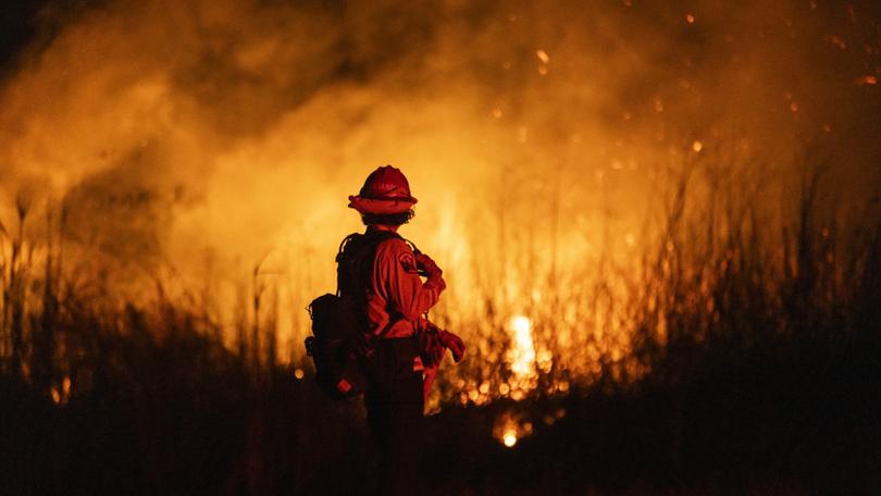 A firefighter at the Auto Fire in Oxnard, north-west of Los Angeles.