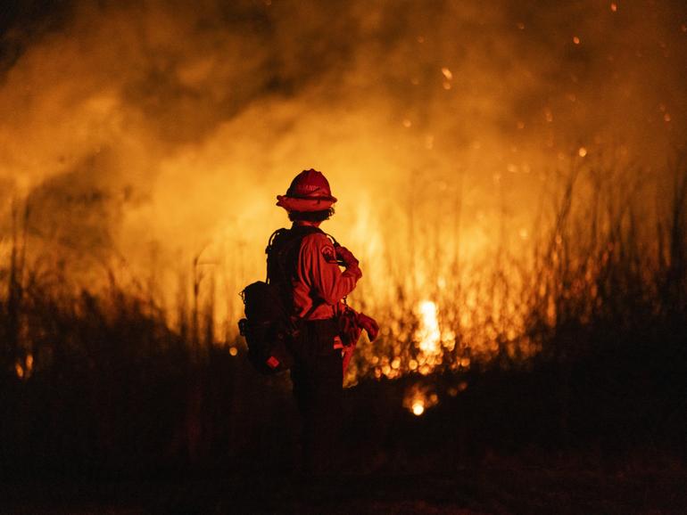 A firefighter at the Auto Fire in Oxnard, north-west of Los Angeles.