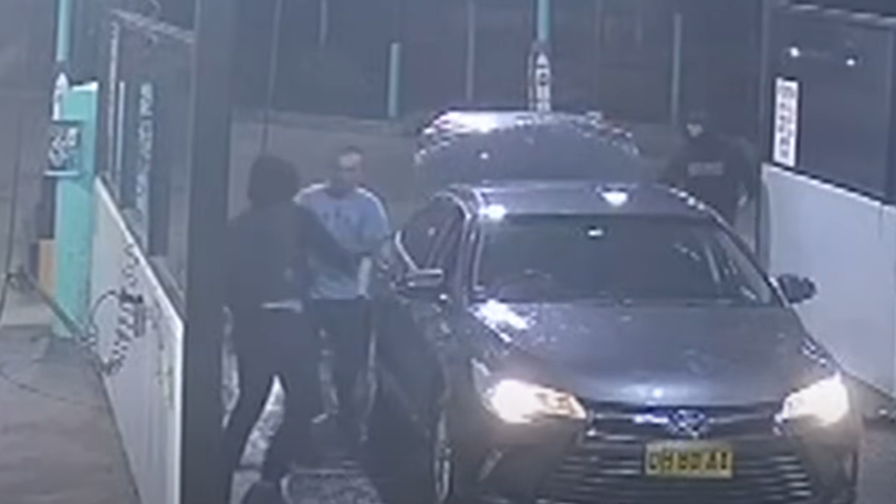 Three men carjacked an Uber driver at a Sydney car wash. 