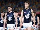 Sam Walsh (left) and Patrick Cripps look dejected after being eliminated from the finals last year.