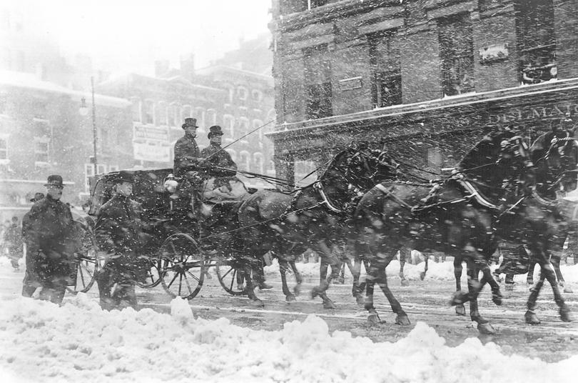 President Theodore Roosevelt and President-elect William Howard Taft ride in a horse-drawn carriage to Taft's Inauguration on March 4, 1909. Library of Congress