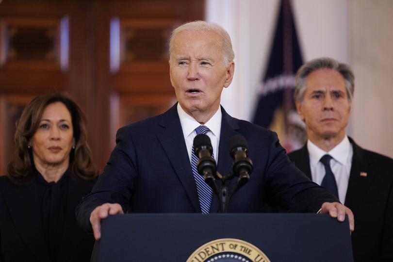 US President Joe Biden (front), Vice President Kamala Harris and Secretary of State Antony Blinken (back left-right).