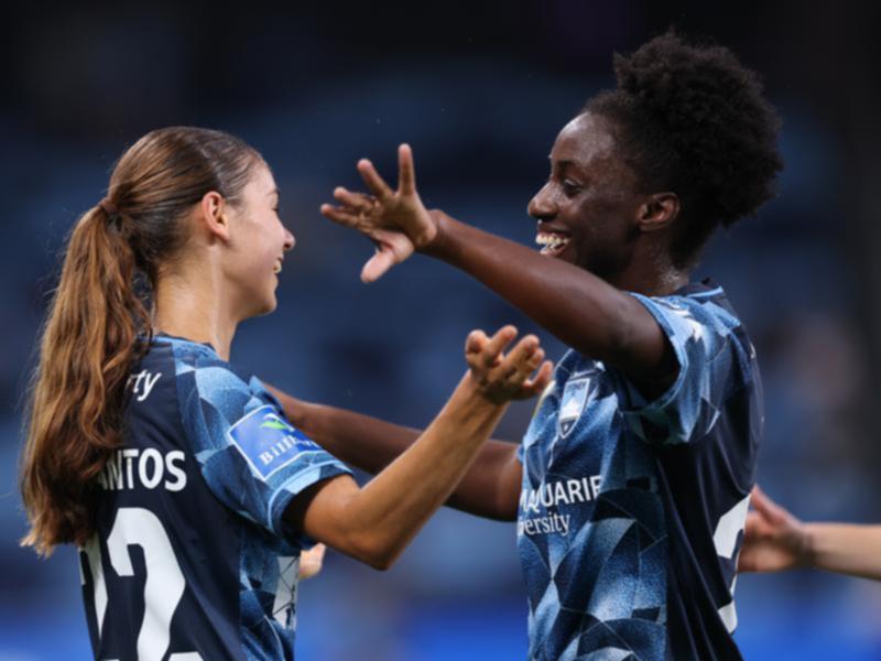 Princess Ibini (r) got on the scoresheet for Sydney before their match with Canberra was abandoned. 