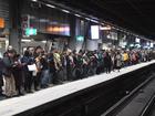 Storms added to rail chaos from industrial action, disrupting NSW commuters for a second day. (Peter Rae/AAP PHOTOS)