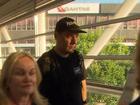 Matthew Norman, one of the returned Bali five walks through the airport and back into public life.