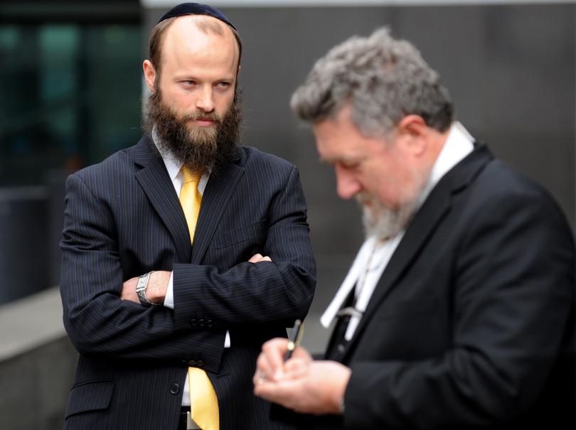 Menachem Vorchheimer (left) outside the Victoria Police Centre in Melbourne, Tuesday, Aug. 19, 2008.