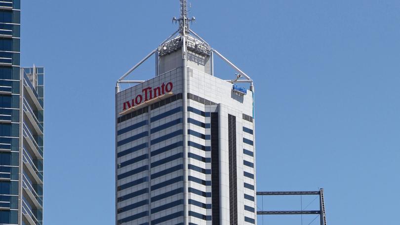 Exterior shots only of Rio Tinto signage on top of Central Park Tower .