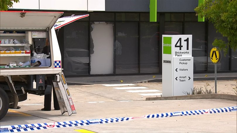The man has been charged weeks after he was shot by police at a furniture store in Brisbane.