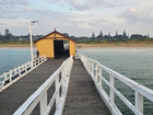 A 62-year-old man has been found dead after being pulled unresponsive from the water near Queenscliff Pier.