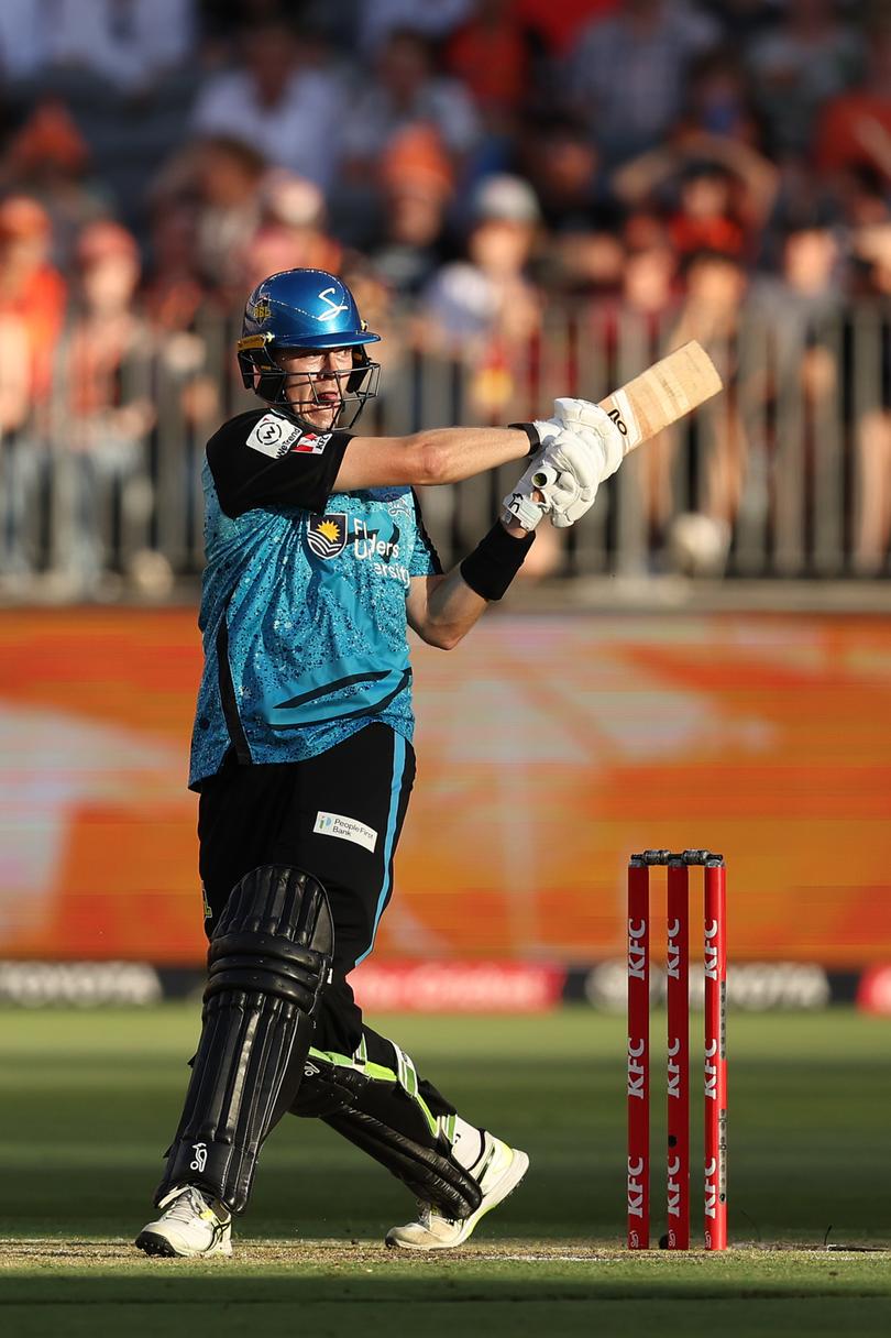 PERTH, AUSTRALIA - JANUARY 18: Liam Scott of the Strikers bats during the BBL match between Perth Scorchers and Adelaide Strikers at Optus Stadium, on January 18, 2025, in Perth, Australia. (Photo by Paul Kane/Getty Images)