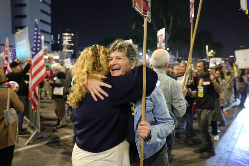 Famiy members of of hostages held by Hamas in Gaza and their supporters react to ceasefire reports during a protest calling for a ceasefire and for the release of the hostages, outside the Likud party headquarters in Tel Aviv, Israel, 15 January 2025. 