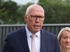 Federal Opposition Leader Peter Dutton and candidate for Lyons Susie Bower at the Brighton IGA in Tasmania.