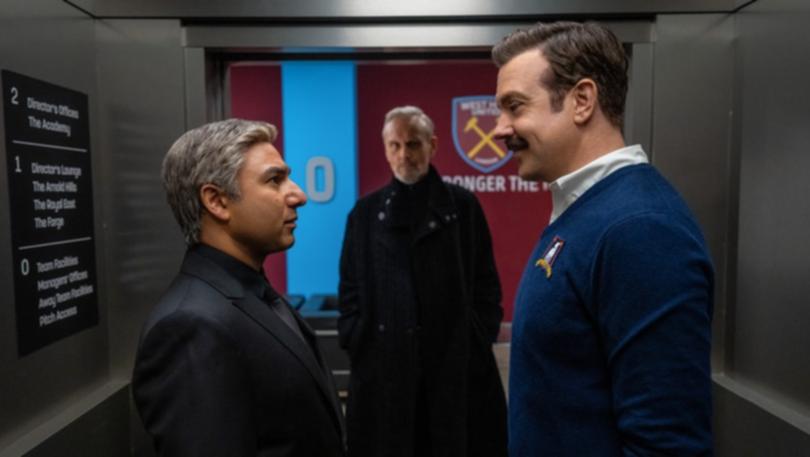 Nick Mohammed and Jason Sudeikis in a scene with Anthony Head.