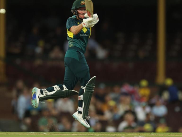 Beth Mooney was airborne in belting 75 to set Australia up for its Ashes-clinching win over England. (Mark Evans/AAP PHOTOS)