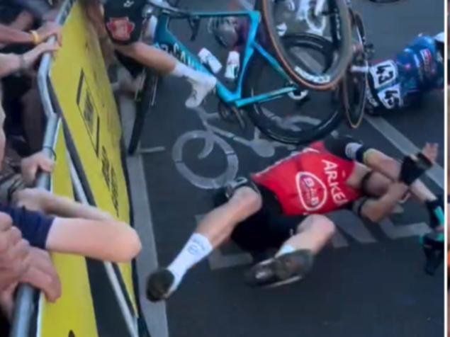 The multi-rider crash at the Tour Down Under sent a woman to hospital.