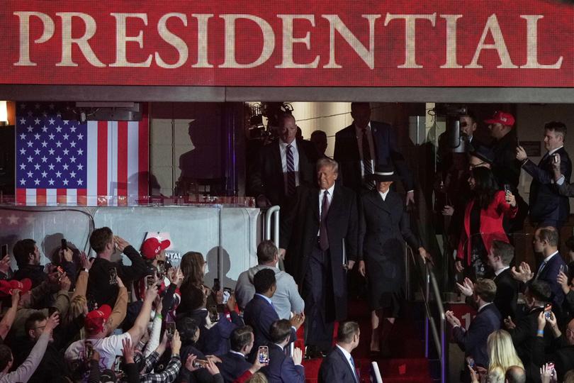 President Donald Trump and first lady Melania Trump arrive.