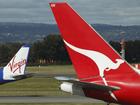 Qantas and Virgin Airline have slashed prices and increased the number of reward seats on offer.