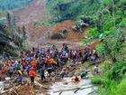 Rescuers search for victims after a landslide hit Indonesia's Central Java (file photo). (EPA PHOTO)