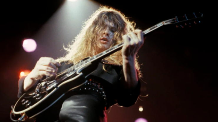 John Sykes pictured performing onstage with Thin Lizzy. 