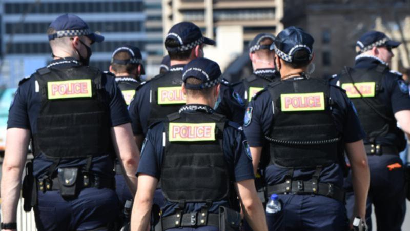 A Brisbane police officer (not pictured) has been suspended after being charged with possessing child abuse material. (Darren England/AAP PHOTOS)