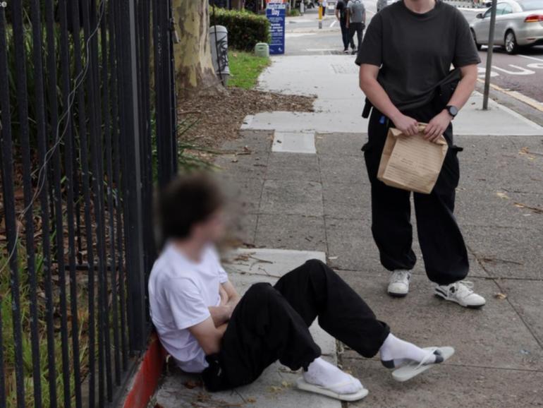 Two young men have been arrested after an off-duty police officer was knocked unconscious. (Supplied by Nsw Police/AAP PHOTOS)