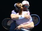 Olivia Gadecki and John Peers celebrate winning the Australian Open mixed doubles crown. 