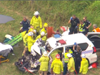 An officer has been trapped after a police car and a truck collided on Queensland’s Cunningham Hwy.