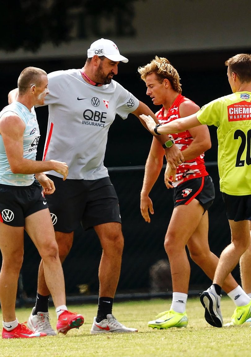 Chad and Corey Warner scuffle at Swans training.