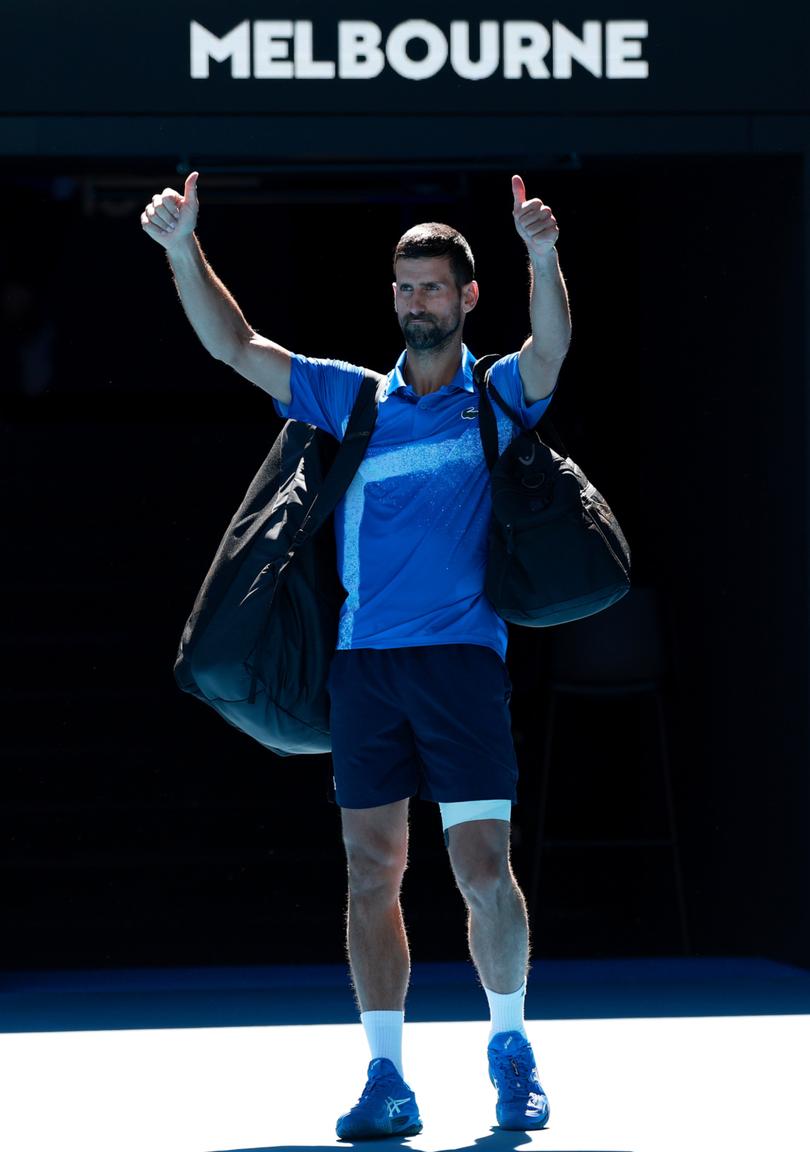 Novak Djokovic acknowledges the crowd as he leaves the court.