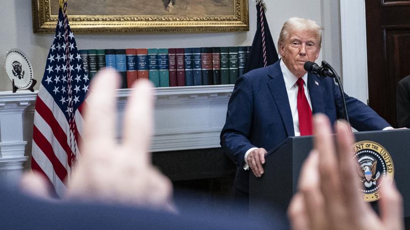 President Donald trump takes questions from reporters during a press conference at the White House.