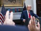 President Donald trump takes questions from reporters during a press conference at the White House.