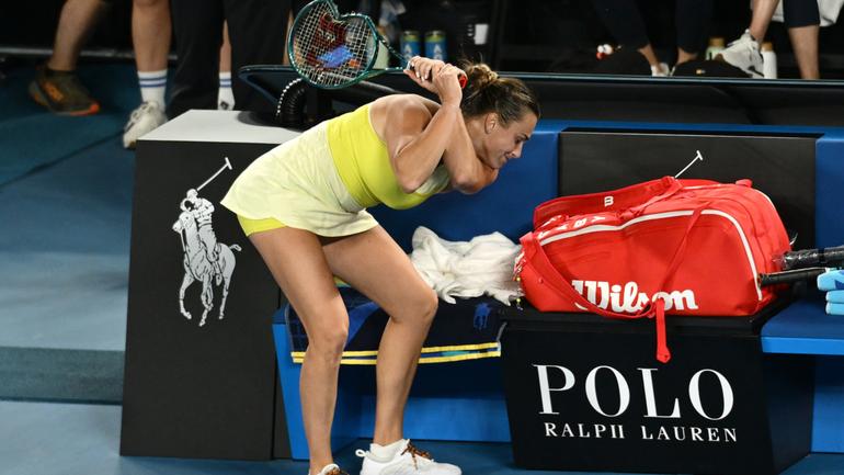 Aryna Sabalenka throws her smashed racket after her defeat by Madison Keys.