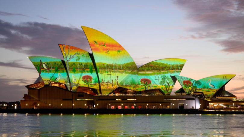 The sails of Sydney's Opera House were lit up to mark Australia Day. (Steven Markham/AAP PHOTOS)