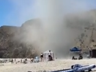 The beach was packed with families when the freak weather event occurred. 